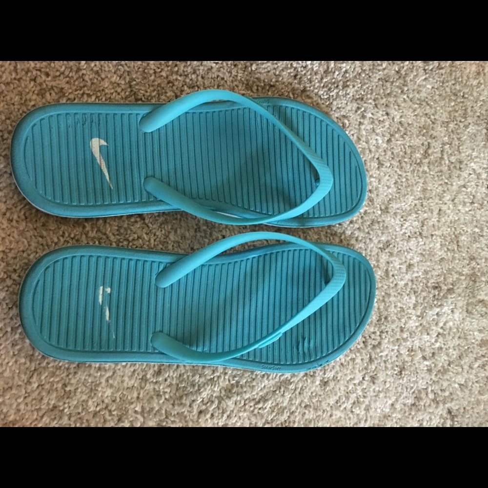 Nike flip-flops.